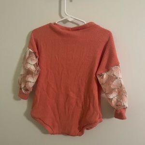 Custom made top with see through sleeves. 18m washed never worn.
